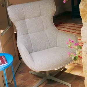 Sillón tapizado en tela bouclé Elsa